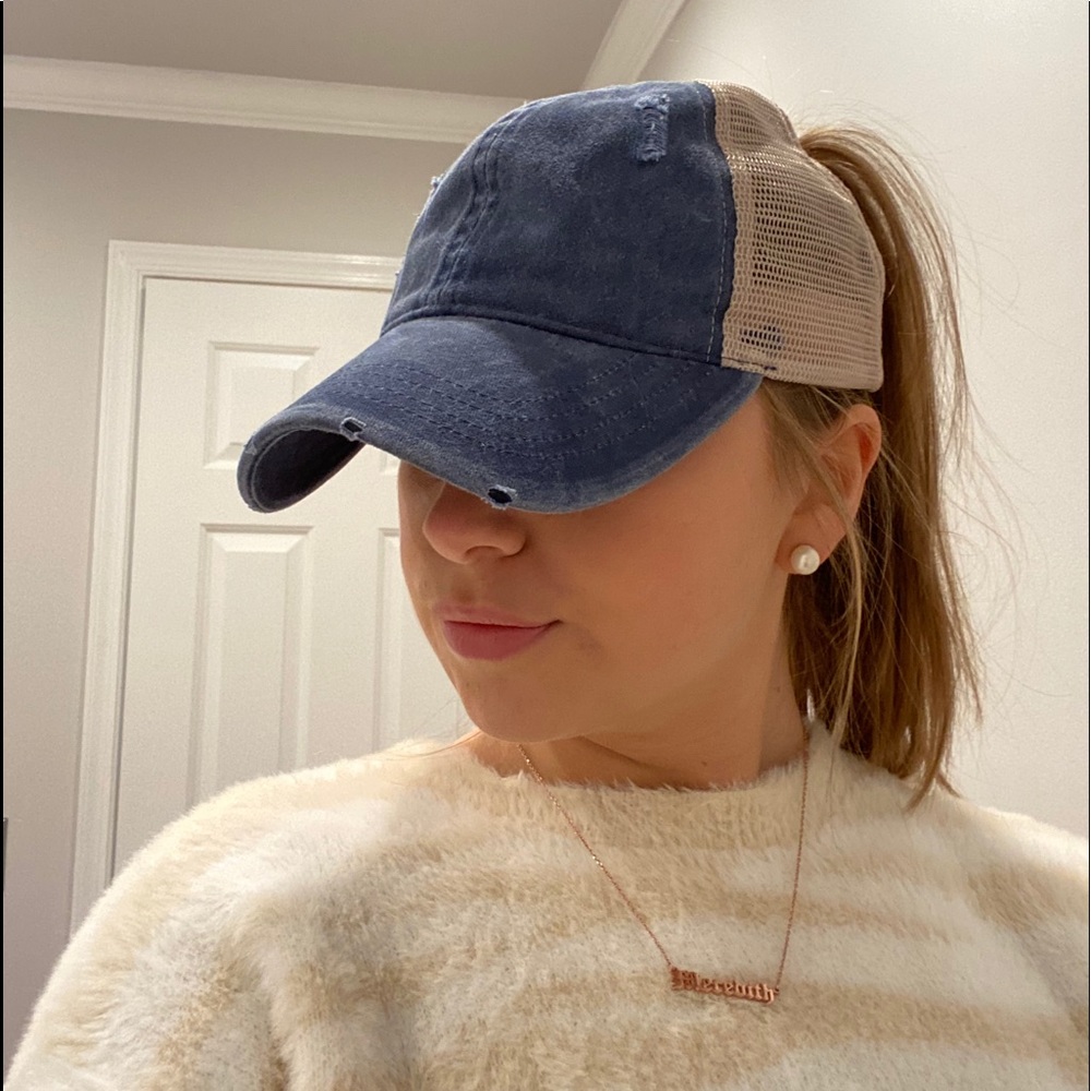 High ponytail trucker hat
